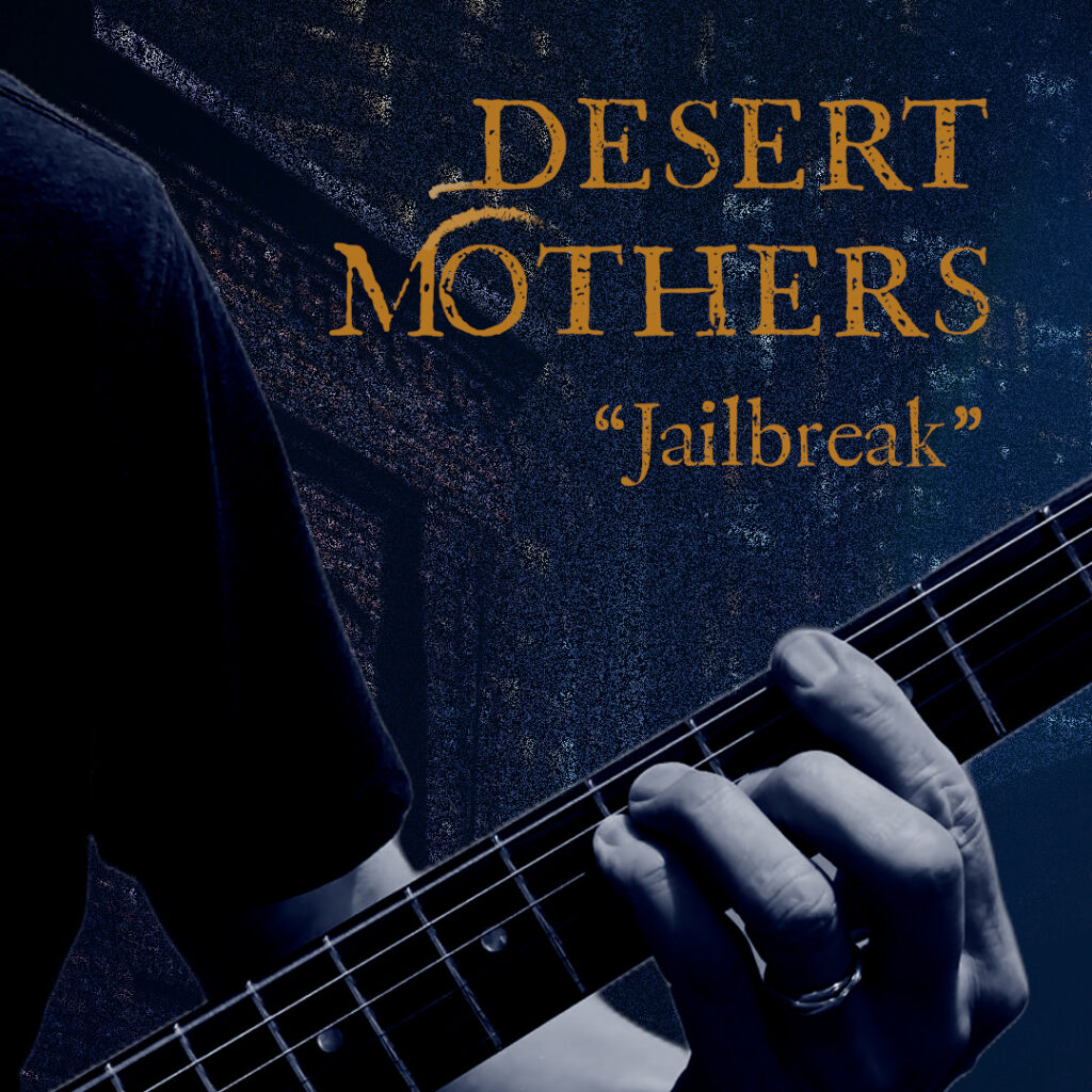 Closeup of Spencer Critchley's hand on guitar neck next to the words 'Desert Mothers / "Jailbreak"'