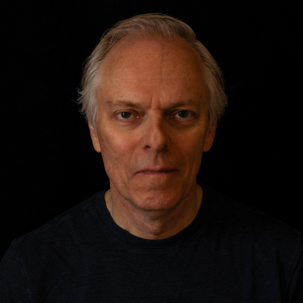 Spencer Critchley in a black t-shirt, close-up